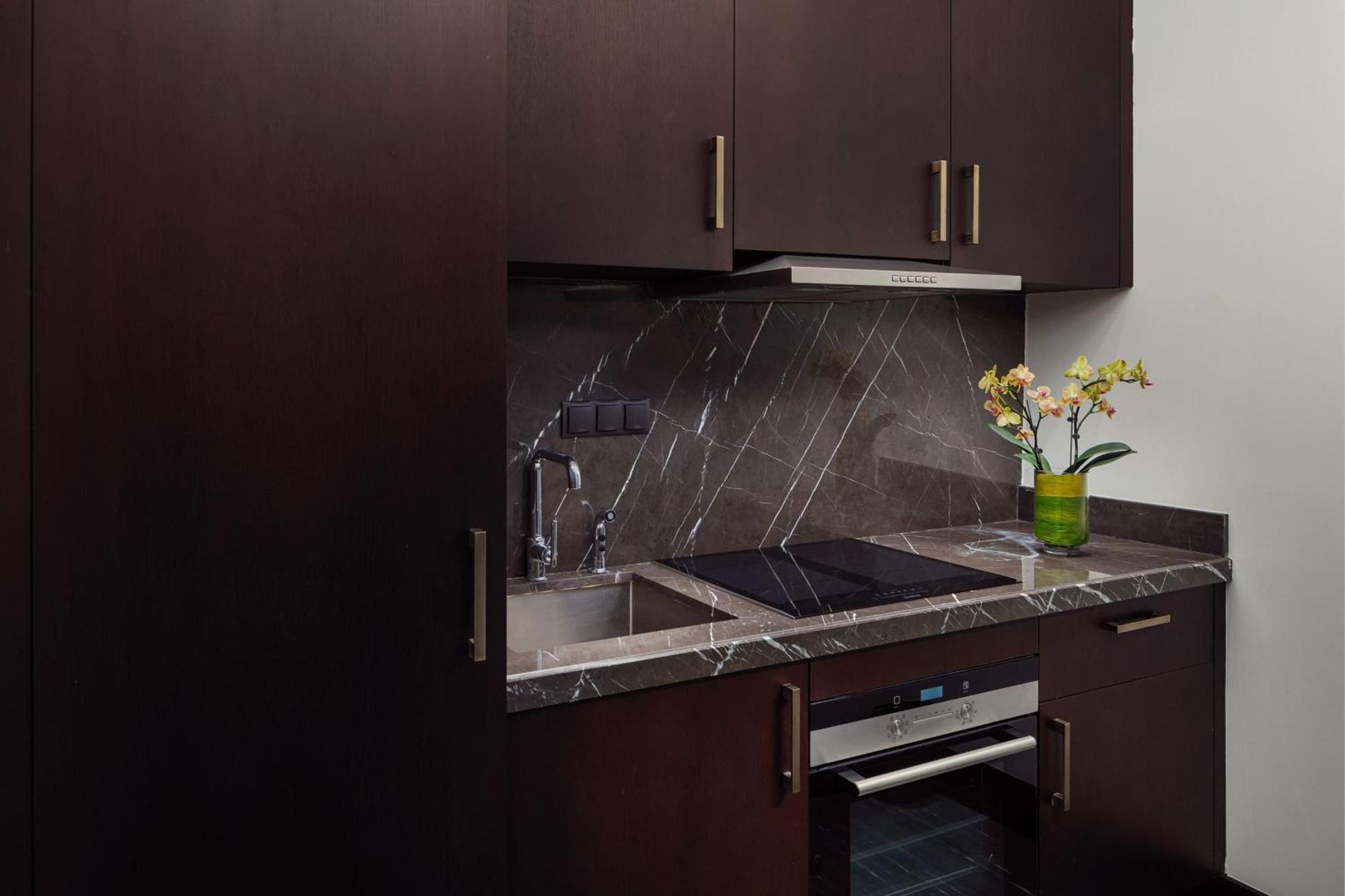 The St. Regis Astana Hotel Eksteriør billede A kitchen in a typical apartment